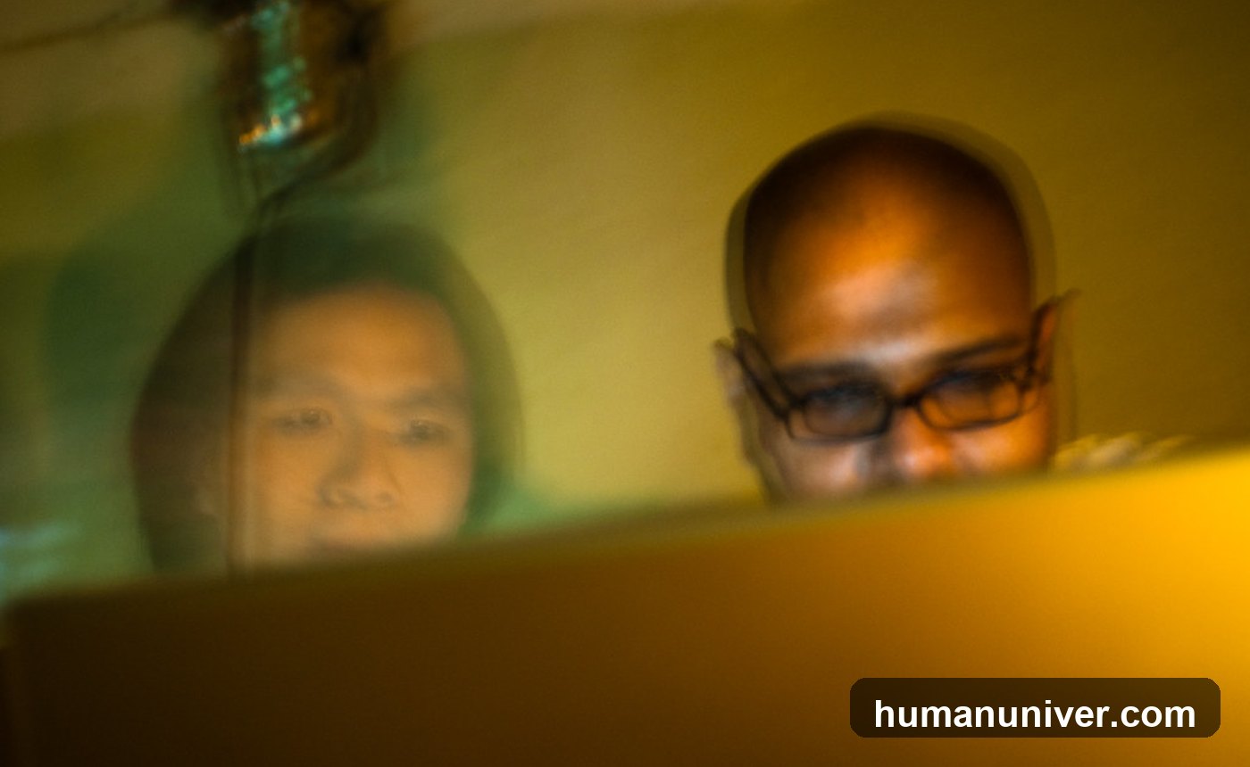 Person looking tired while working on a laptop